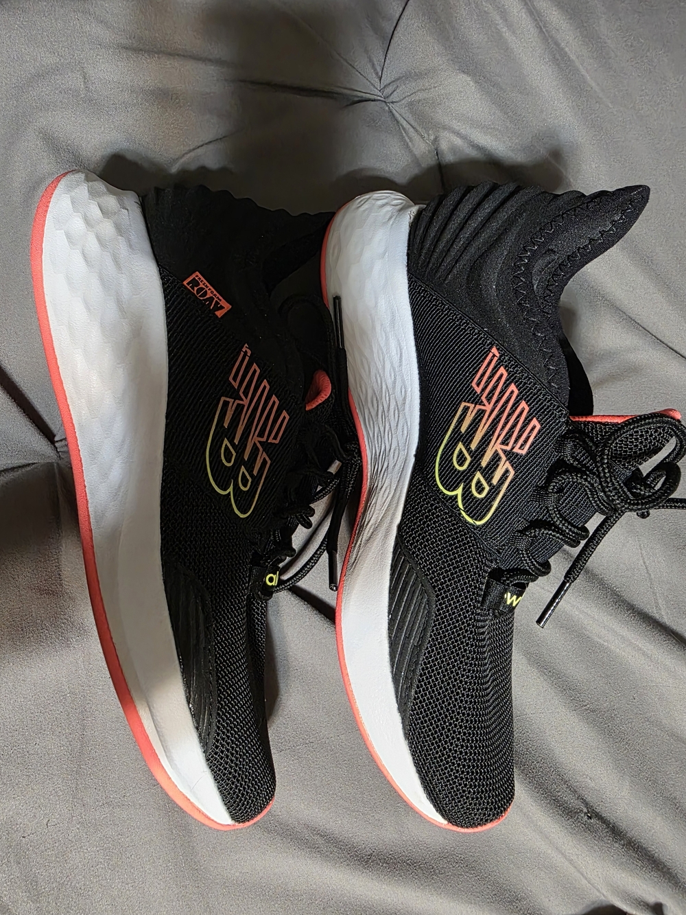 New Balance Black Running Shoes with Coral & Yellow Accents